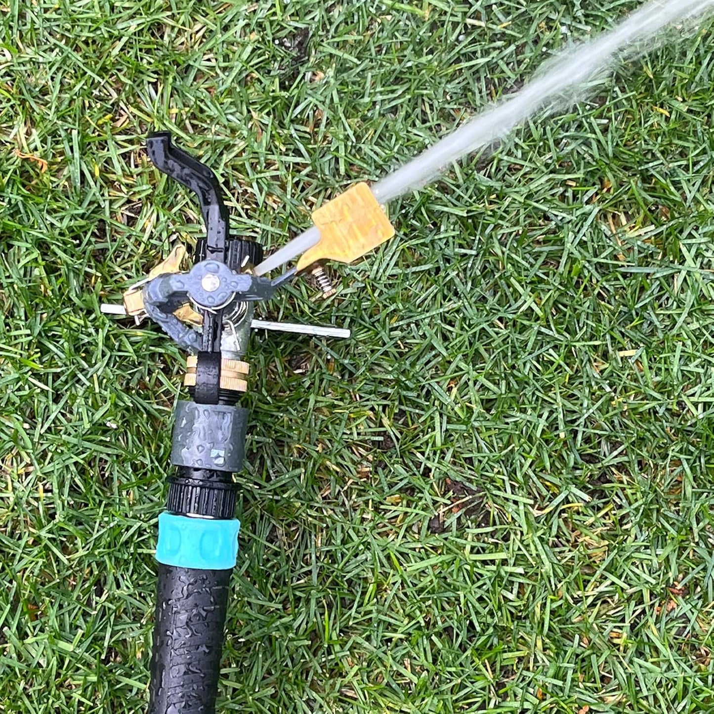 Pulsating Impact Lawn Sprinkler 300009 on Metal Step Spike, Adjustable to 360 Degrees by New England Garden Tools